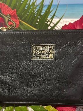 Coach Black Leather Wristlet with Gold Logo Patch